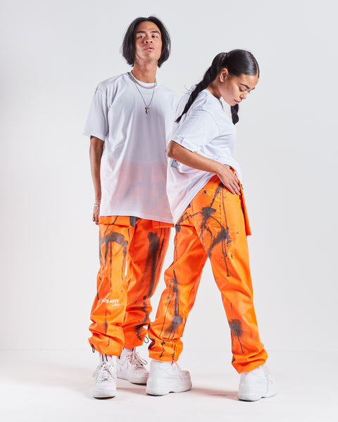 HAUS Party Track Pants - Orange / Paint